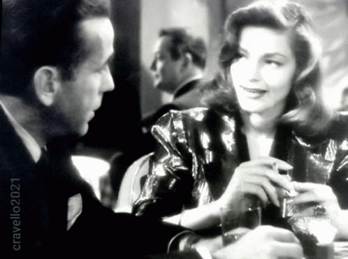 A Black And White Photo Of A Man And A Woman With A Caption That Says Cravell21 GIF