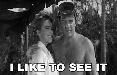 A Black And White Photo Of A Man And A Woman With The Words I Like To See It Above Them GIF