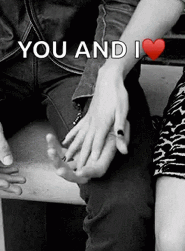A Black And White Photo Of A Man And Woman Holding Hands With The Words `` You And I '' Written Above Them . GIF