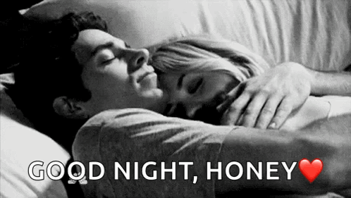 A Black And White Photo Of A Man And Woman Hugging In Bed With The Words Good Night Honey GIF