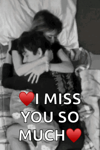 A Black And White Photo Of A Man And Woman Hugging With The Words " I Miss You So Much " Above Them GIF