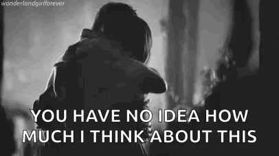 A Black And White Photo Of A Man And Woman Hugging With The Words `` You Have No Idea How Much I Think About This '' GIF