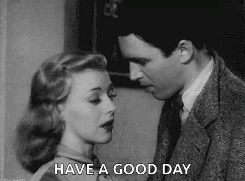 A Black And White Photo Of A Man And Woman Kissing With The Words `` Have A Good Day '' . GIF