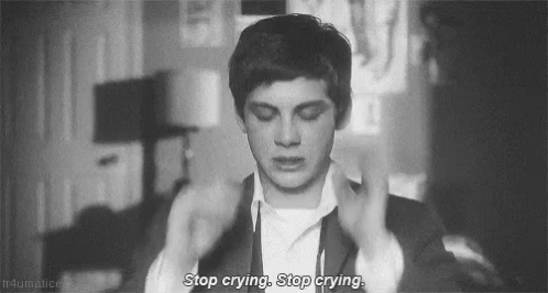 A Black And White Photo Of A Man Crying With The Words `` Stop Crying , Stop Crying . '' GIF