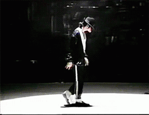 a black and white photo of a man dancing