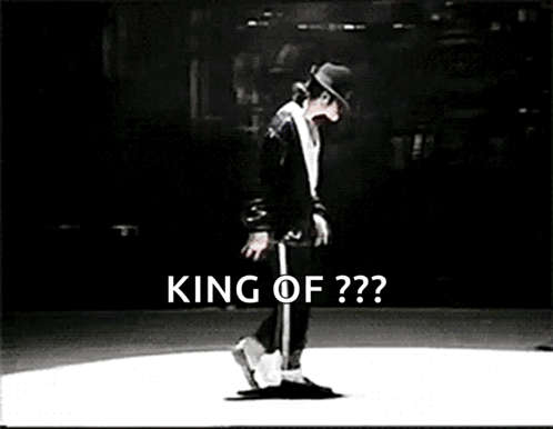 A Black And White Photo Of A Man Dancing On A Stage With The Caption `` King Of ? '' GIF