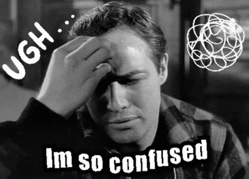 A Black And White Photo Of A Man Holding His Head With The Words Im So Confused Below Him GIF