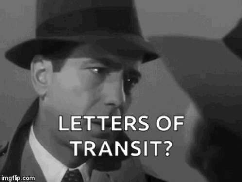 a black and white photo of a man in a hat and tie asking letters of transit .
