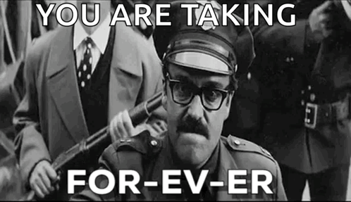 A Black And White Photo Of A Man In A Police Uniform Holding A Gun With The Caption `` You Are Taking For-Ev-Er '' GIF