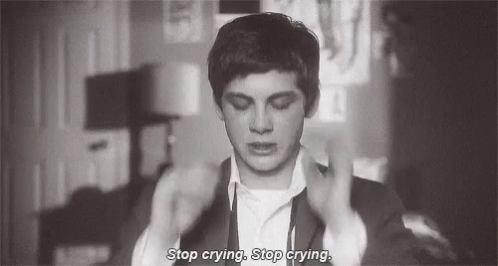 A Black And White Photo Of A Man In A Suit And Tie Saying `` Stop Crying , Stop Crying . '' GIF