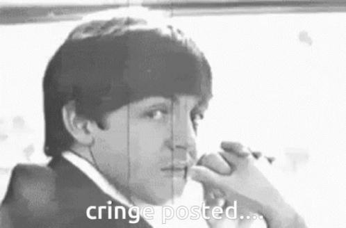 A Black And White Photo Of A Man In A Suit With The Words `` Cringe Posted '' Written On The Bottom . GIF