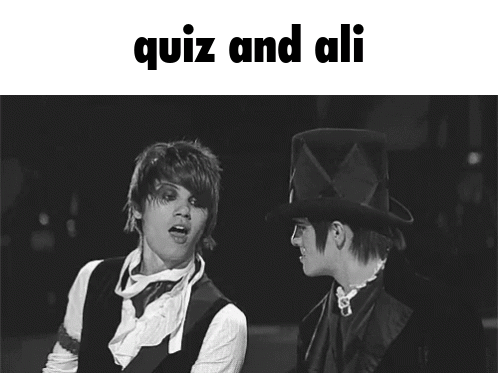 A Black And White Photo Of A Man In A Top Hat With The Words Quiz And Ali Above Him GIF