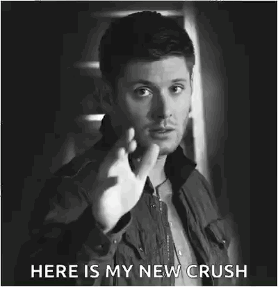 A Black And White Photo Of A Man Making A Funny Face And Saying `` Here Is My New Crush '' . GIF