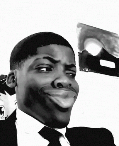 A Black And White Photo Of A Man Making A Funny Face GIF