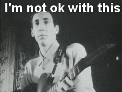 a black and white photo of a man playing a guitar with the words i 'm not ok with this above him