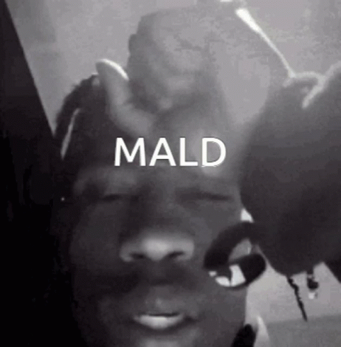 A Black And White Photo Of A Man 'S Face With The Word Mald On It . GIF