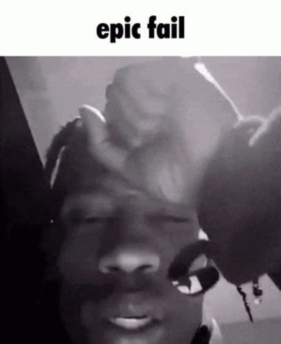 A Black And White Photo Of A Man 'S Face With The Words Epic Fail Above It GIF