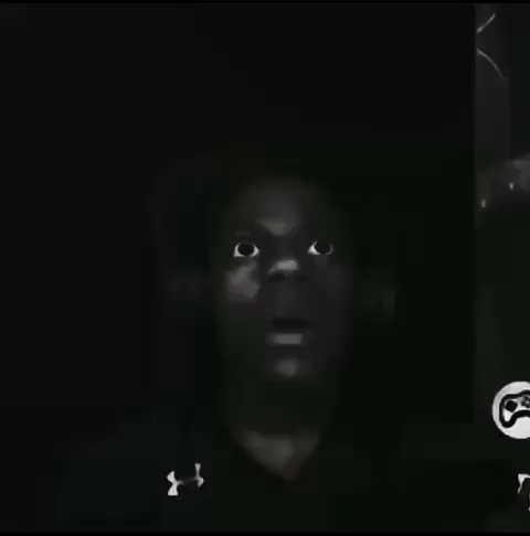 A Black And White Photo Of A Man 'S Face With Under Armour On His Shirt GIF