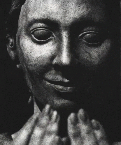 A Black And White Photo Of A Man Screaming With His Mouth Open GIF