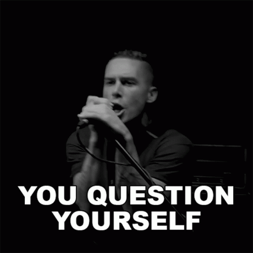 A Black And White Photo Of A Man Singing Into A Microphone With The Words You Question Yourself Below Him GIF