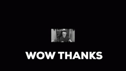 A Black And White Photo Of A Man Sitting In Front Of A Computer And The Words Wow Thanks . GIF