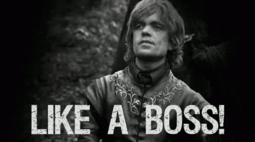 A Black And White Photo Of A Man Standing In The Woods With The Words `` Like A Boss '' . GIF