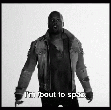 A Black And White Photo Of A Man Wearing A Denim Jacket . GIF