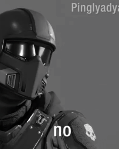 A Black And White Photo Of A Man Wearing A Helmet With The Word No Written On It GIF