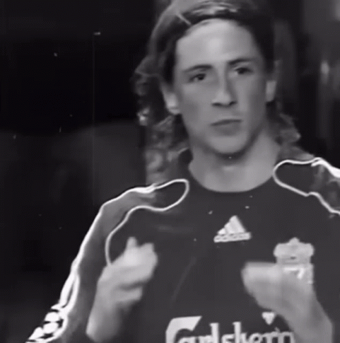 A Black And White Photo Of A Man Wearing An Adidas Jersey GIF