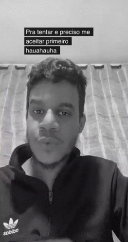 A Black And White Photo Of A Man Wearing An Adidas Shirt GIF