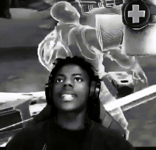 A Black And White Photo Of A Man Wearing Headphones With A Cross In The Background GIF