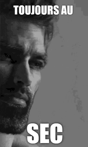 a black and white photo of a man with a beard and the words toujours au sec on the bottom