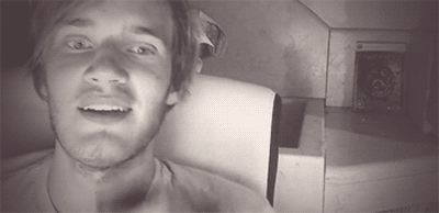 A Black And White Photo Of A Man With A Beard GIF