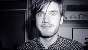 A Black And White Photo Of A Man With A Beard GIF
