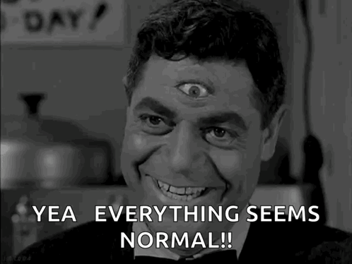 A Black And White Photo Of A Man With A Third Eye And The Words " Yea Everything Seems Normal " GIF
