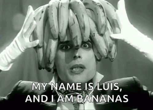 A Black And White Photo Of A Man With Bananas On His Head And The Caption My Name Is Luis And I Am Bananas GIF