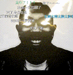 A Black And White Photo Of A Man With Chinese Writing Around His Head GIF