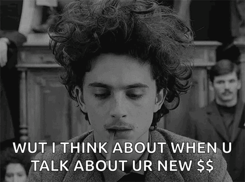 A Black And White Photo Of A Man With Curly Hair Saying Wut I Think About When U Talk About Ur New $ GIF