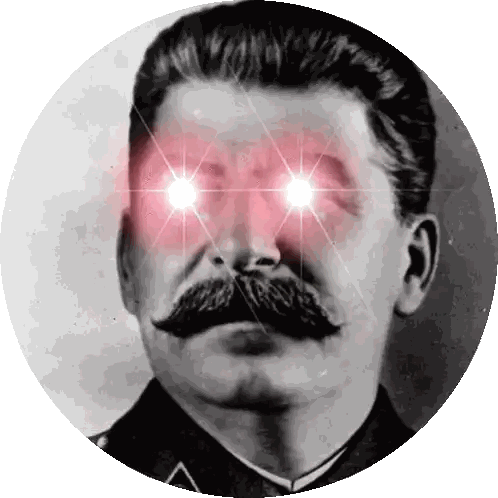 a black and white photo of a man with glowing red eyes