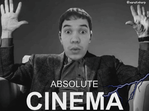 a black and white photo of a man with his hands in the air and the caption absolute cinema