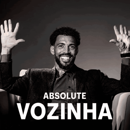 A Black And White Photo Of A Man With His Hands In The Air And The Words Absolute Vozinha Behind Him GIF