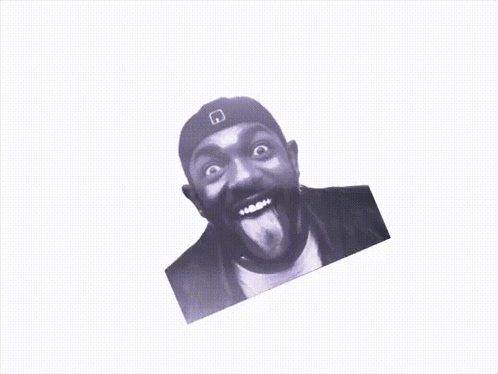 A Black And White Photo Of A Man With His Tongue Out GIF