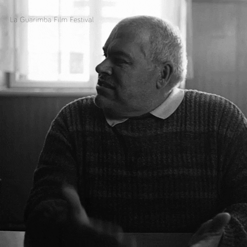 A Black And White Photo Of A Man With La Guarimba Film Festival Written On The Bottom Right GIF
