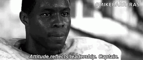 A Black And White Photo Of A Man With Sweat On His Face And The Words `` Attitude Reflects Leadership , Captain . '' GIF