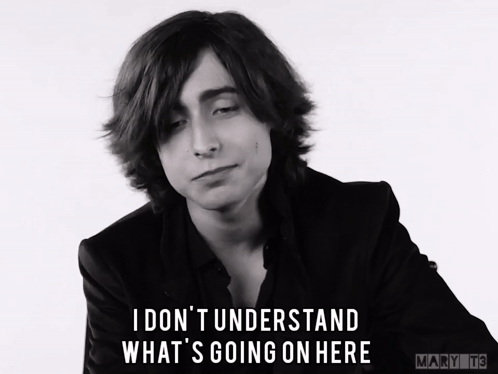 A Black And White Photo Of A Man With The Caption I Don T Understand What 'S Going On Here GIF