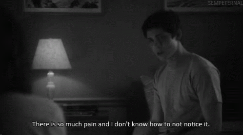 A Black And White Photo Of A Man With The Caption " There Is So Much Pain And I Don T Know How To Not Notice It GIF