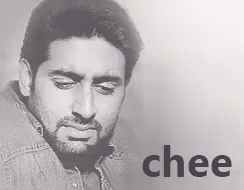 A Black And White Photo Of A Man With The Word Chee In The Corner GIF
