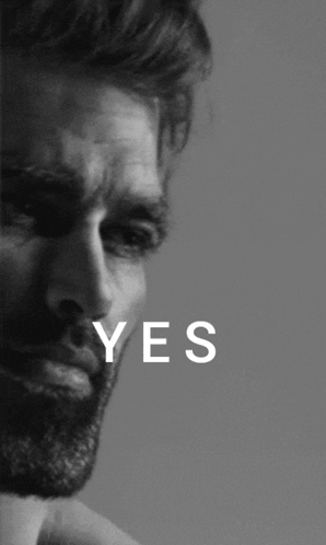 A Black And White Photo Of A Man With The Word Yes Written On It GIF