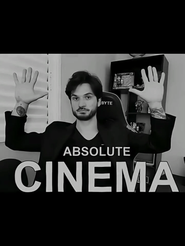 A Black And White Photo Of A Man With The Words " Absolute Cinema " Above Him GIF