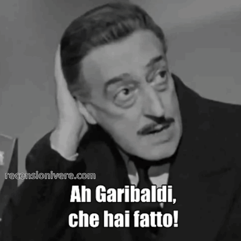 A Black And White Photo Of A Man With The Words Ah Garibaldi Che Hai Fatto On The Bottom GIF